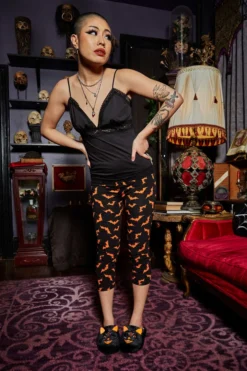What's New SOURPUSS ORANGE LUNA BATS KNIT CAPRIS