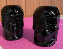 Haunted Homewares SOURPUSS SKULL CANDLESTICK HOLDERS BLACK